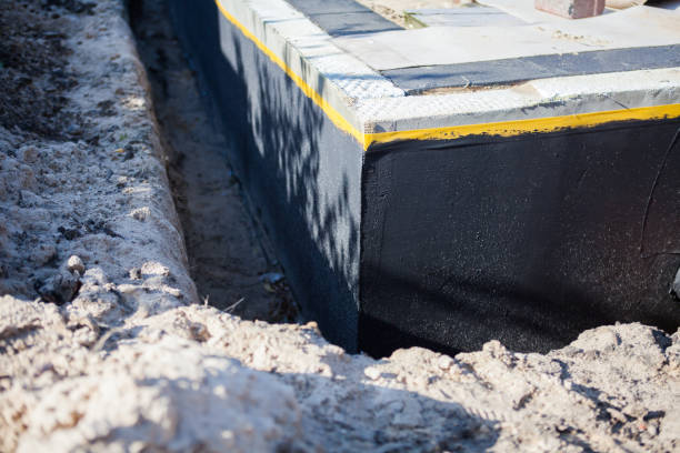 Professional Waterproofing technician working in Oregon, WI